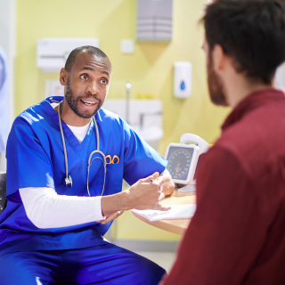 Medical practice team reviewing local SEO performance and patient appointment data on a computer